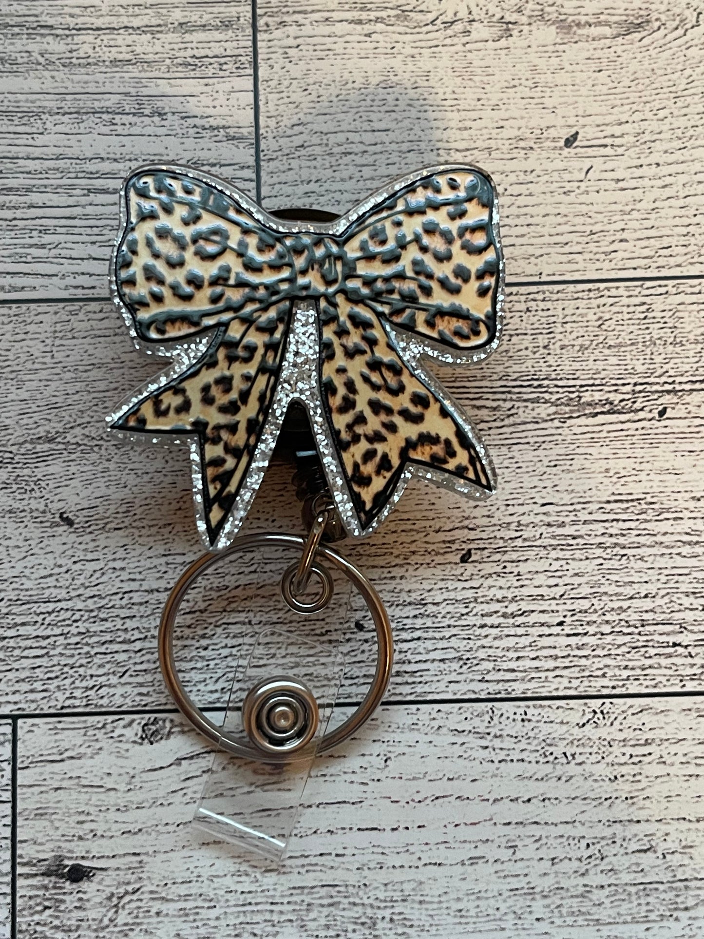 Cheetah Bow Badge Reel